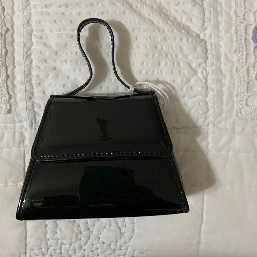 Mini trapezoid crossbody purse
